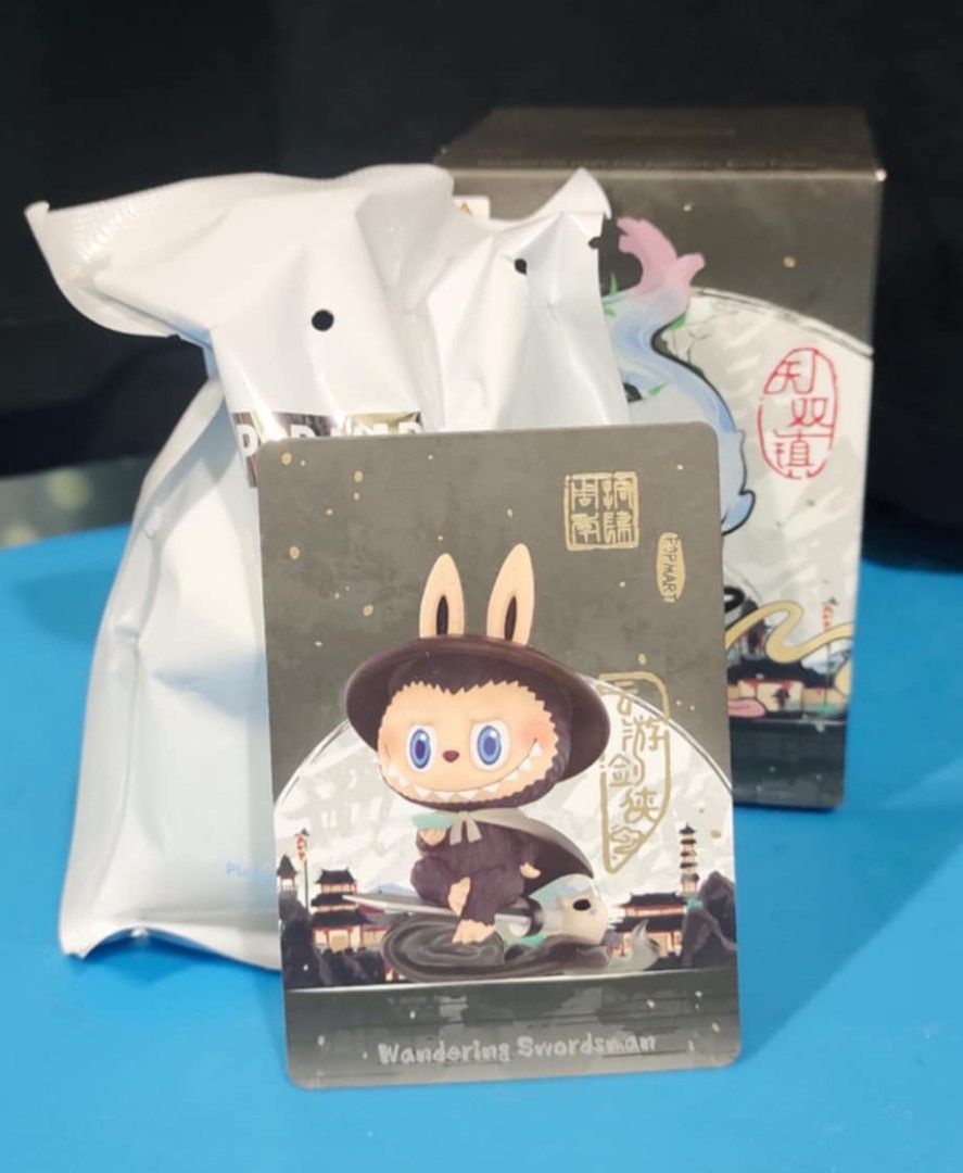 Pop Mart Matchless 14th Anniversary Series (Category: Designer & Blind Box Toys) located in Antipolo. Submitted by legoninos.legoninas (Listing ID 1334632169, Image 1). Description: sealed foil opened at the bottom Available: Wandering Swordsman.
