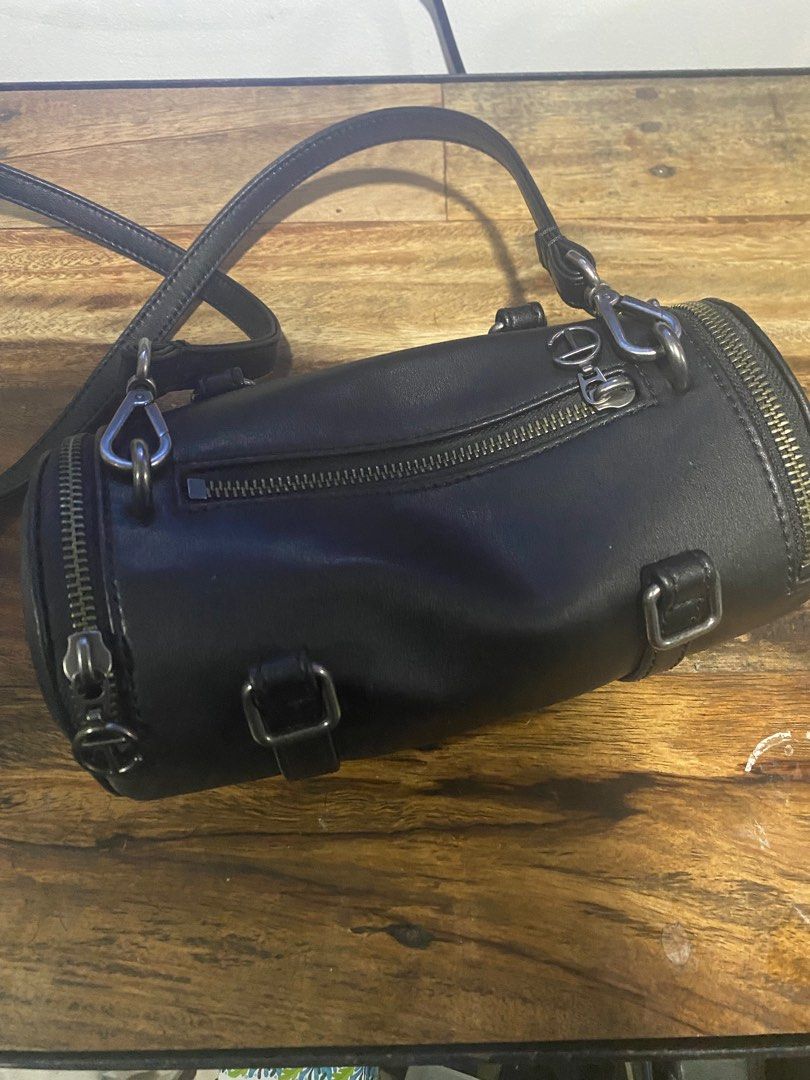 Telfar Mini Duffel (Category: Shoulder Bags) located in Taguig. Submitted by declutterprince2 (Listing ID 1334685156, Image 2). Description: Telfar Mini Duffel Rarely used Removed handled/crossbody strap only Brand New Price: Php 12k With dustbag.
