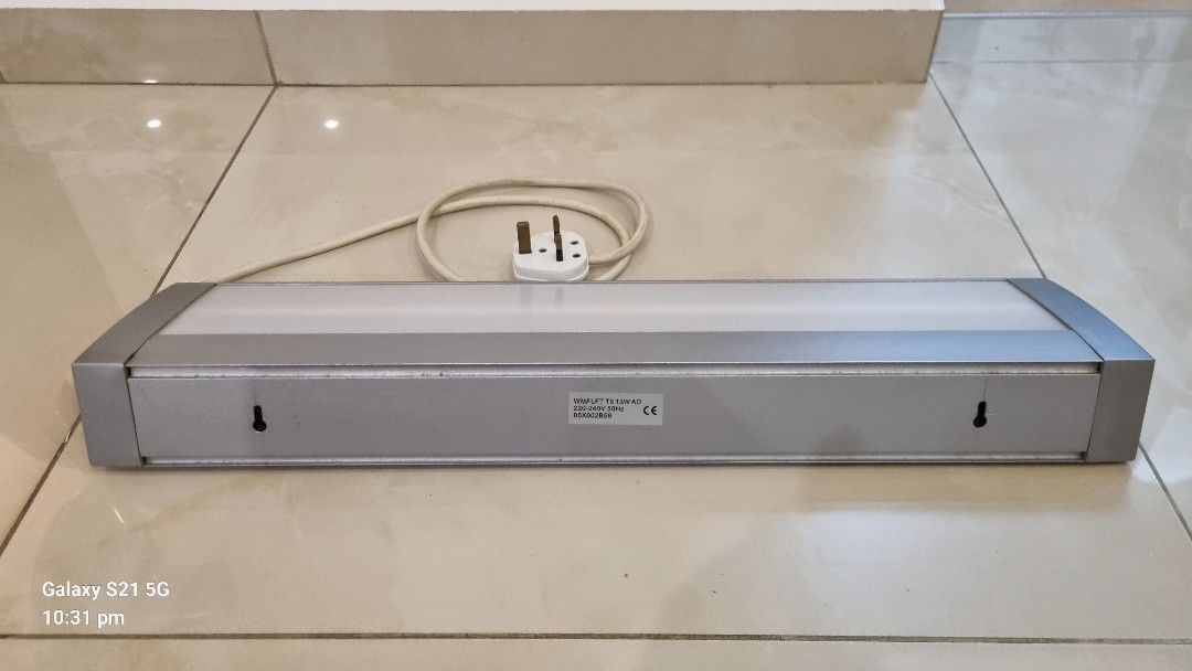 Wall-Mount Study Light (T5 13W) (Category: Lighting) located in Singapore. Submitted by mikemak57 (Listing ID 1334690708, Image 2). Description: Study light to be wall mounted. Adequate lighting for study table. Require AC 230V power. Extra used T5-13W fluorescent tube included (total: 2 tubes)..