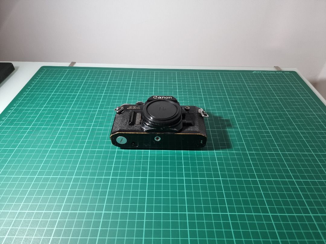 Canon AE-1 (Category: Cameras) located in Las Pinas. Submitted by qwjax (Listing ID 1296279302, Image 2). Description: Black edition As is condition Freebies: Canon 35-70 f/3.5-4.5 Camera grip.