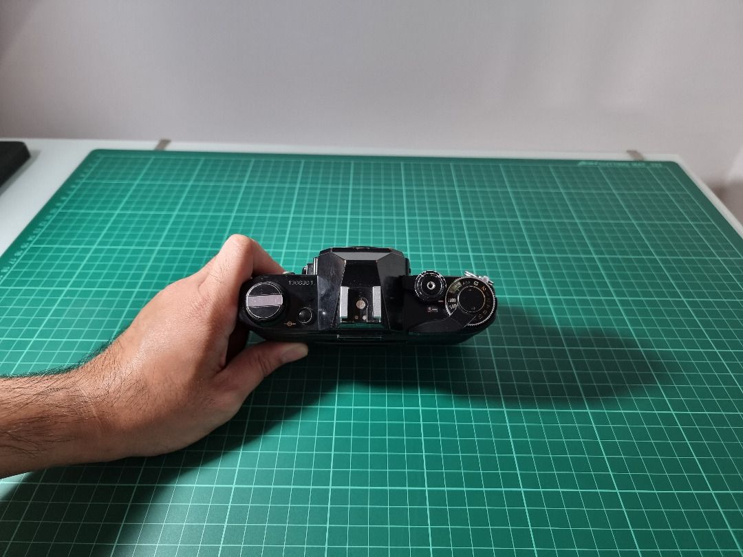 Canon AE-1 (Category: Cameras) located in Las Pinas. Submitted by qwjax (Listing ID 1296279302, Image 3). Description: Black edition As is condition Freebies: Canon 35-70 f/3.5-4.5 Camera grip.