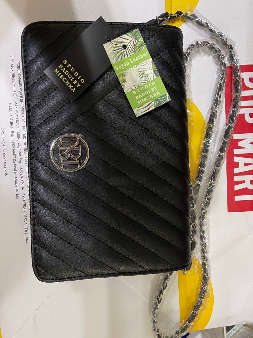 Crossbody Bag (Category: Luxury Bags & Wallets) located in Pasig City. Submitted by fancytracy (Listing ID 1334869979, Image 3). Description: Studio Badgley Mischka Crossbody Bag Vegan Leather with chain strap With card slots and zipped pocket.