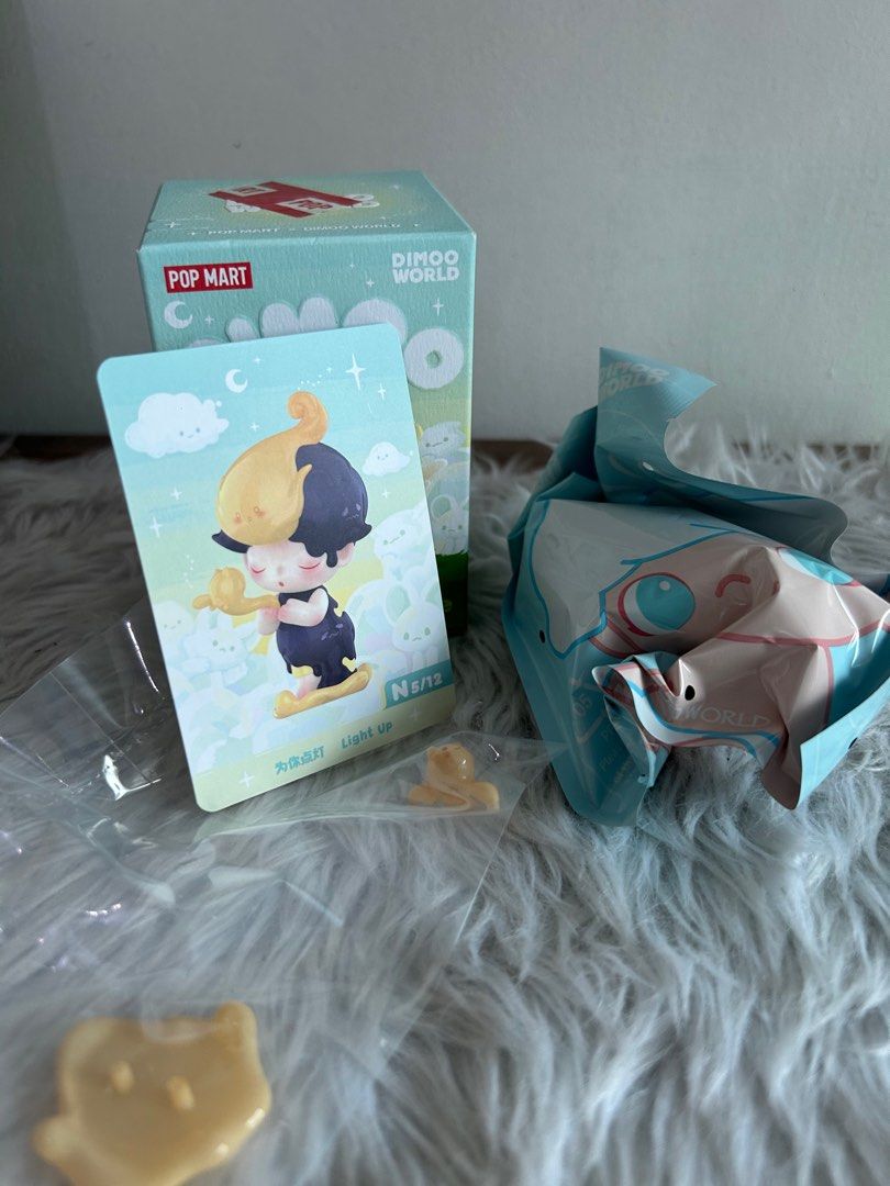 Dimoo world by your side Light Up (Category: Designer & Blind Box Toys) located in Caloocan City. Submitted by kzoneee (Listing ID 1334756670, Image 1). Description: Bought from Popmart Moa Unsealed foil. Meet up at sm north or any mrt stations.