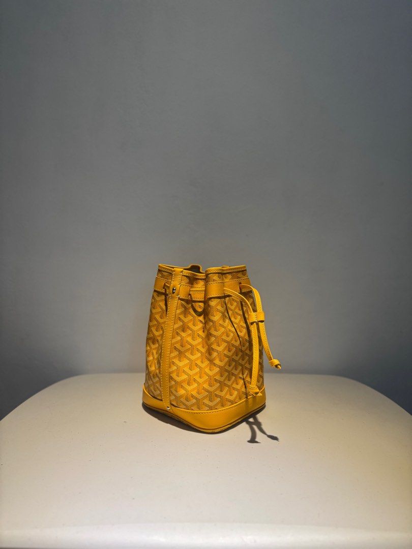 Goyard Petit Flot Bucket Bag (Category: Luxury Bags & Wallets) located in Cainta. Submitted by habiier (Listing ID 1334766828, Image 1). Description: Goyard Petit Flot Bucket Bag • Color: Yellow • Condition: Store-fresh • Inclusions: Complete papers, Dust bag, Paper bag.