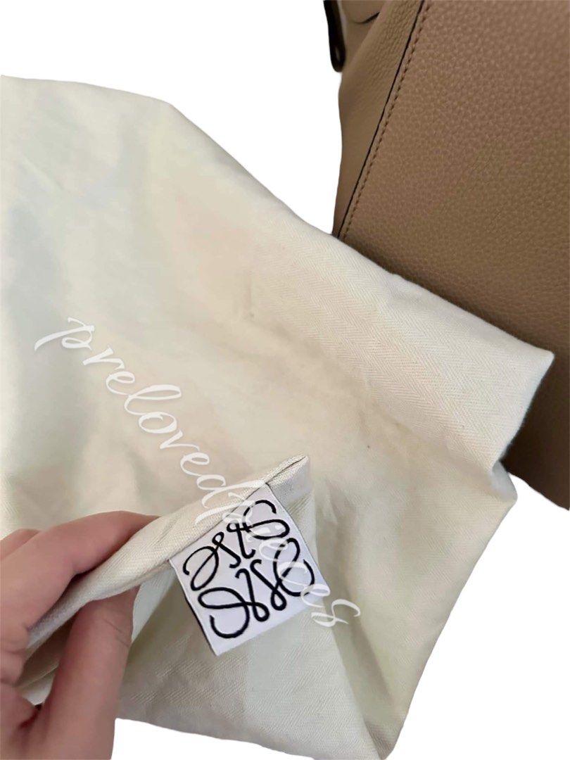 Guaranteed Authentic Loewe Small Hammock Bag in Soft Grained Calfskin (Category: Luxury Bags & Wallets) located in Taguig. Submitted by wanderandco (Listing ID 1334838708, Image 3). Description: Guaranteed Authentic/Original, you name it. I'll triple your money back if proven otherwise. Inclusions are in the photo posted. Lightly used as you can see from the condition of the bag. DM for serious buyer only..