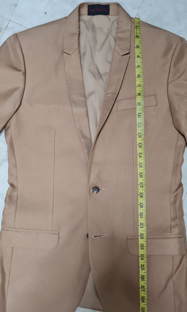 Mens tan suit set (Category: Sets & Coordinates) located in Antipolo. Submitted by red18m (Listing ID 1334782569, Image 1). Description: mens tan suit set coat pants vest measurements on the photos fits tall slim guys used only for a shoot good as new fixed price posted gcash payment for delivery only.