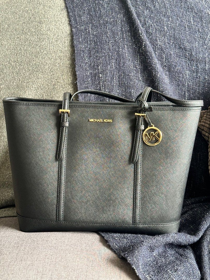 Michael kors bag that fits laptop hot sale