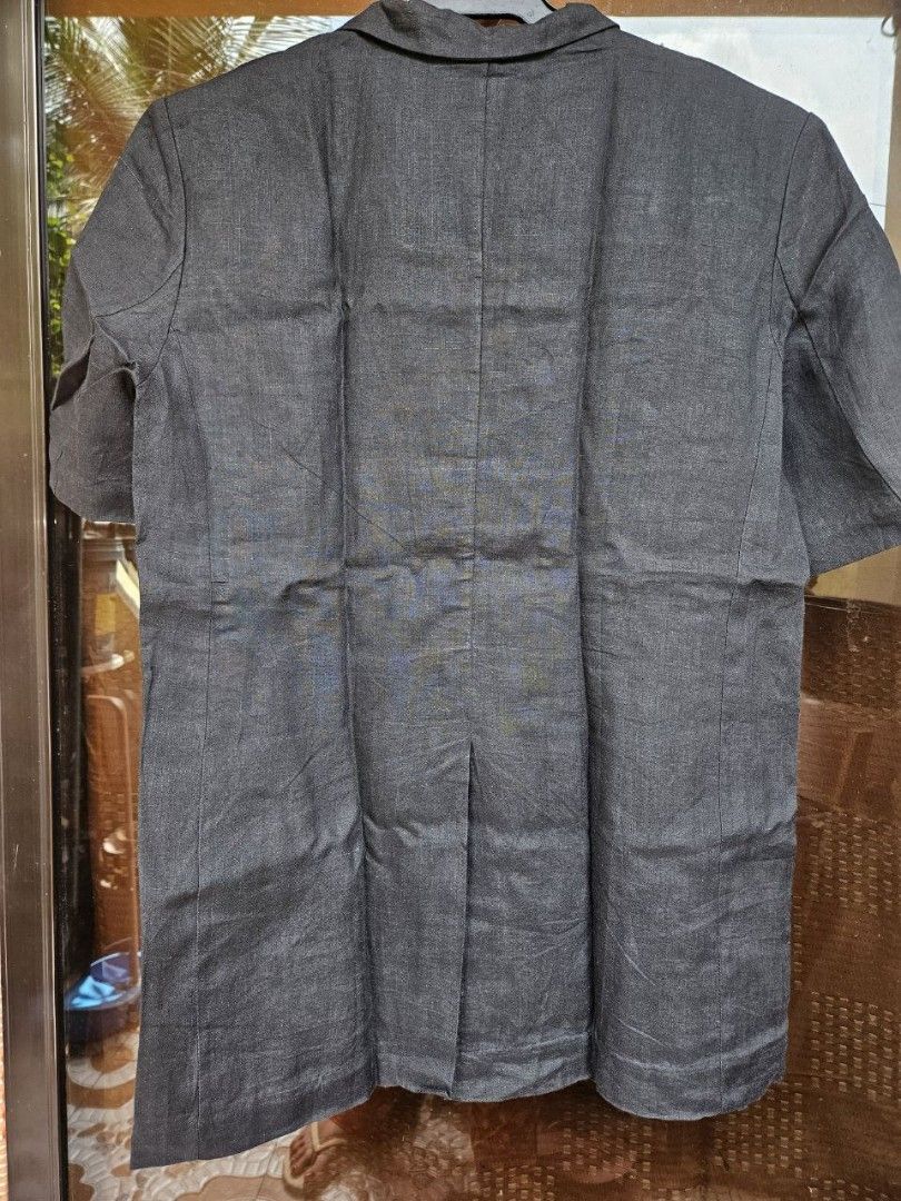 Oversized Black Linen Short Sleeve Top Coat (Category: Coats, Jackets and Outerwear) located in Pasay City. Submitted by reccaaaa (Listing ID 1334737215, Image 3). Description: Size: Large to XL kinda oversize style Other Details: • linen fabric • black in actual • complete buttons • no issues, kusot lang RFS: Declutter Location: Pasay No return, no exchange.