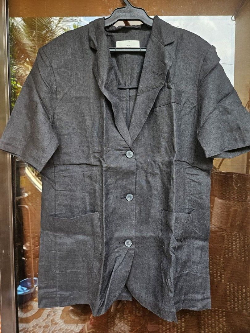 Oversized Black Linen Short Sleeve Top Coat (Category: Coats, Jackets and Outerwear) located in Pasay City. Submitted by reccaaaa (Listing ID 1334737215, Image 1). Description: Size: Large to XL kinda oversize style Other Details: • linen fabric • black in actual • complete buttons • no issues, kusot lang RFS: Declutter Location: Pasay No return, no exchange.