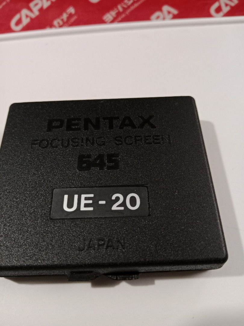 PENTAX 645 UE-20 Focusing Screen (Category: Other Photography Accessories) located in Tabaco. Submitted by fritznicoleshoppe (Listing ID 1334805331, Image 3). Description: PENTAX 645 UE-20 Focusing Screen with genuine case & accessory. you may request for additional photos. selling as is *buyer can avail the FREEBIES listed.