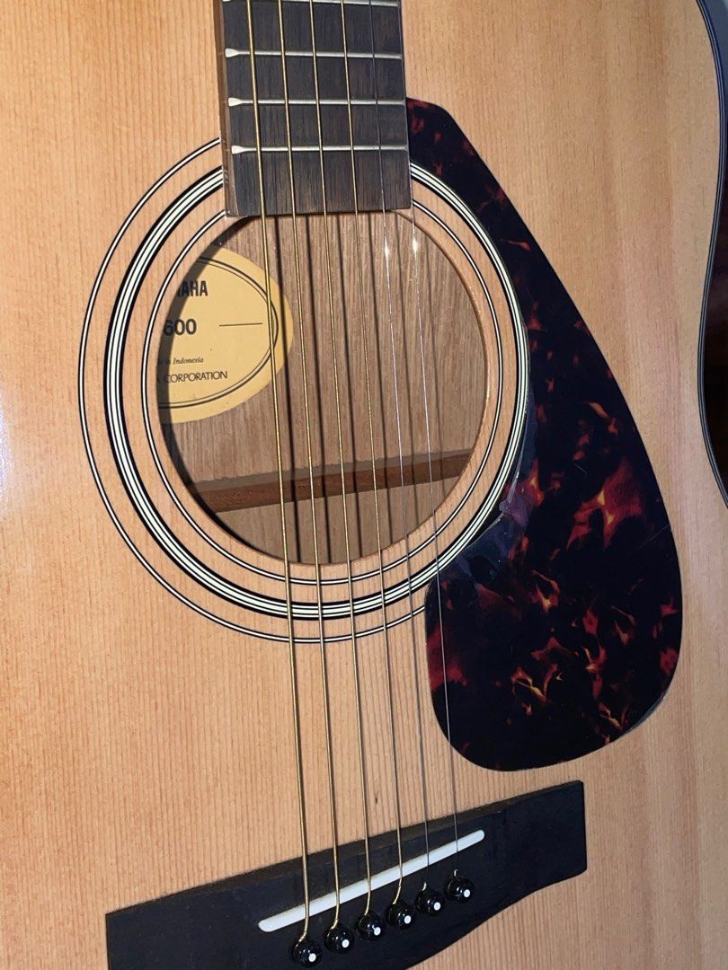 YAMAHA F600 Guitar (Category: Musical Instruments) located in Manila. Submitted by reign0718 (Listing ID 1334827297, Image 3). Description: This Yamaha F600 acoustic guitar is in superb condition and suitable for both beginners and seasoned musicians. The F600 is known for its rich tone and excellent build quality, and it produces a warm, full sound that complements any musical style. With a comfortable neck and simple playability, it’s great for