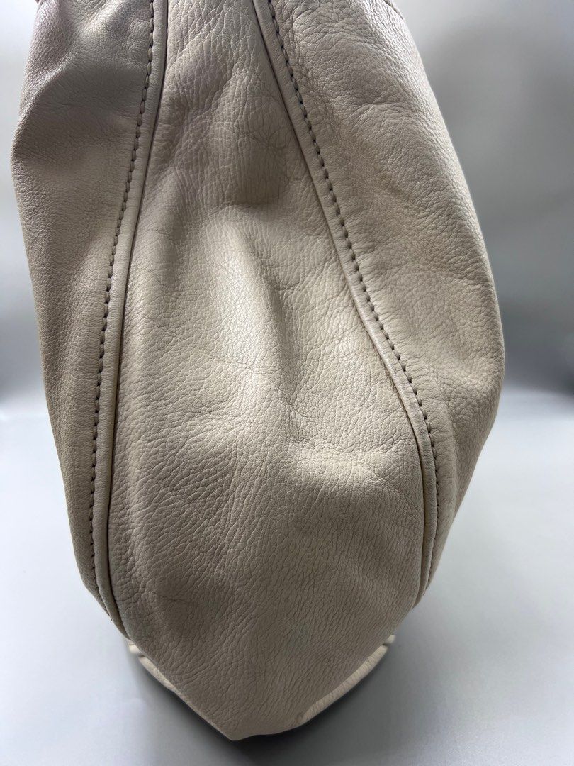 Authentic MiuMiu Hobo Bag (Category: Luxury Bags & Wallets) located in Cagayan de Oro. Submitted by riggstuffs (Listing ID 1334992851, Image 3). Description: ➡️ Guaranteed Authentic MiuMiu Hobo Bag Soft leather material Clean interior and exterior area Spacious interior No other inclusion Flaw: the balconies and white code are somewhat cut. Disclaimer: Riggstuffs is not associated or affiliated with the brand posted. All copyrights and trademarks