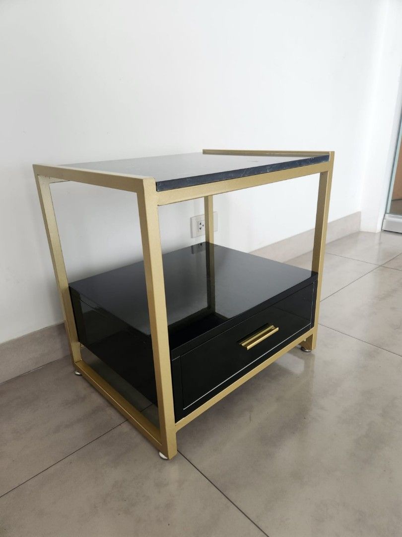 Black marble modern side table (Category: Tables & Sets) located in San Juan City. Submitted by justshoppingandselling (Listing ID 1335018615, Image 2). Description: P5950 per table. 2 pcs available 50cm length 40cm depth 50cm height used for 6 months rfs: no more space. need to remove furnitures no main issues. i can send more photos upon request.