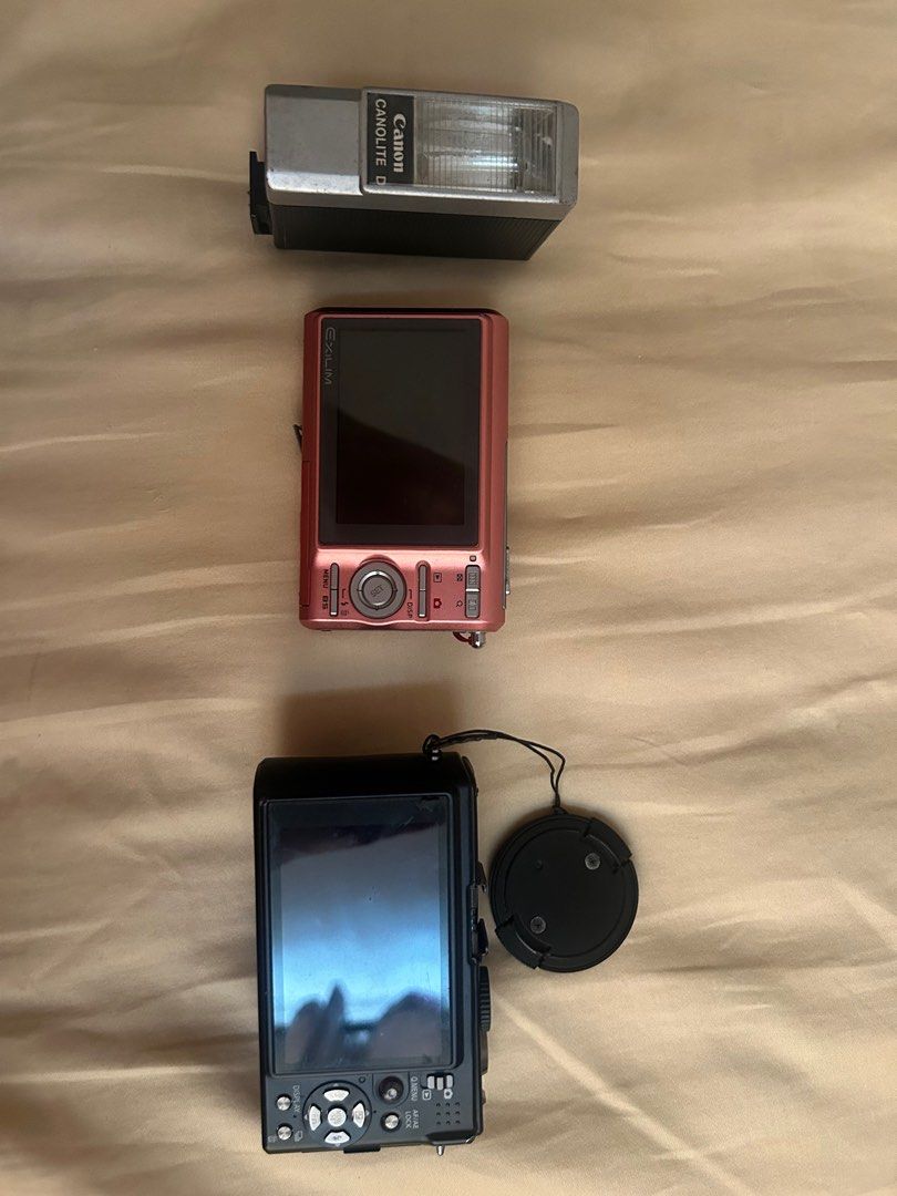DIGICAMS UNTESTED (Category: Cameras) located in Binan City. Submitted by vintagebyella (Listing ID 1334906793, Image 3). Description: 3000 TAKE ALL LUMIX DMC-LX3: was working, all of a sudden stopped working, comes with battery (1,500) Casio Exilim: untested (1000) Canonlite D flash: untested (1000) All negotiable.