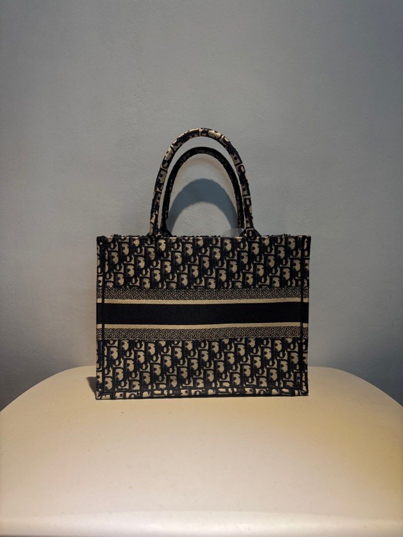 Dior Medium Book Tote (Category: Luxury Bags & Wallets) located in Cainta. Submitted by habiier (Listing ID 1334952968, Image 2). Description: Dior Book Tote • Color: Burgundy • Size: Medium • Condition: Good as new • Inclusions: Complete papers, Ribbon, Dust bag, Paper bag.