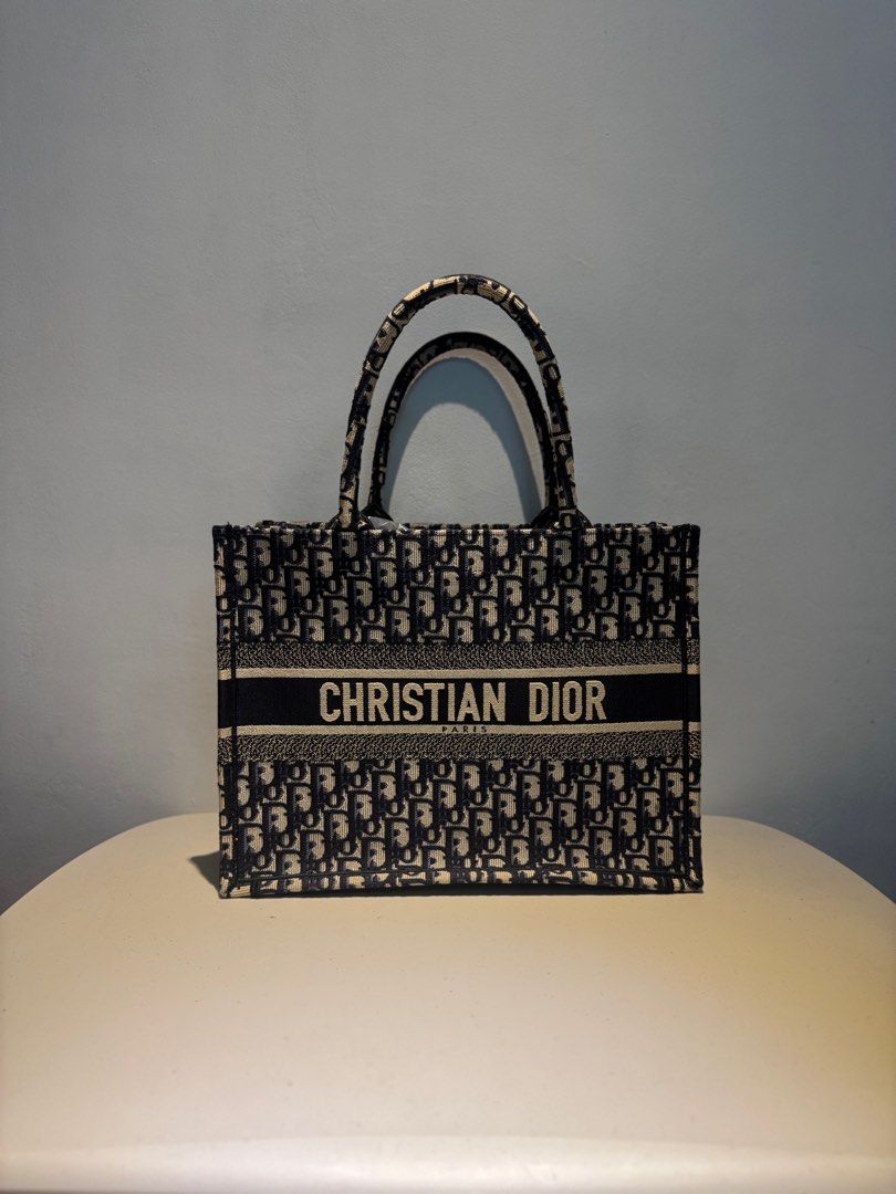 Dior Medium Book Tote (Category: Luxury Bags & Wallets) located in Cainta. Submitted by habiier (Listing ID 1334952968, Image 1). Description: Dior Book Tote • Color: Burgundy • Size: Medium • Condition: Good as new • Inclusions: Complete papers, Ribbon, Dust bag, Paper bag.