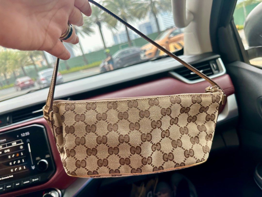 Gucci boat pochette brown (Category: Luxury Bags & Wallets) located in Quezon City. Submitted by purple22 (Listing ID 1334945669, Image 1). Description: RFS: need funds asap SF c/o buyer.