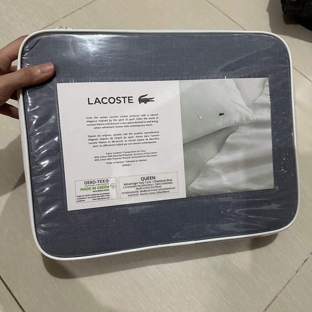 Lacoste Queen size bed sheet set with pillowcase from USA (Category: Bedding & Towels) located in Manila. Submitted by hodlclub (Listing ID 1334994455, Image 2). Description: Brand new. Fitted flat sheets 2 standard pillowcase 20x30 inches (51x76cm) 60% cotton 40% recycled polyester Lightweight elegant sheet designed to suit any bedroom Durable and gets softer the more you wash.