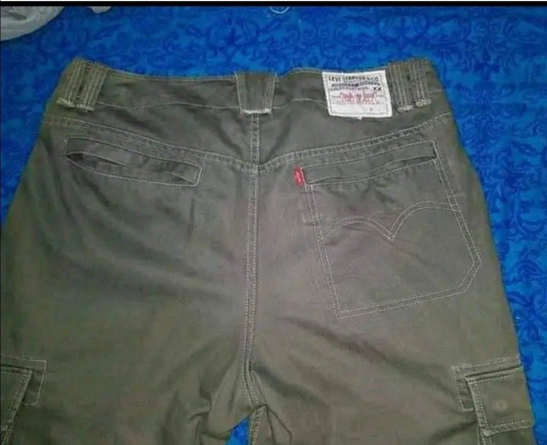 Levi's cargo pants (Category: Jeans) located in Baguio. Submitted by luxeloom099 (Listing ID 1334933232, Image 2). Description: Levi's cargo pants size 38 minimal signs of usage.