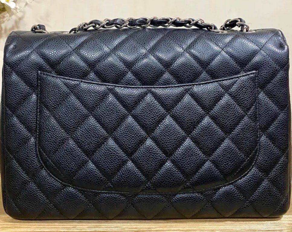 Chanel Classic Flap Jumbo Caviar (Category: Luxury Bags & Wallets) located in Quezon City. Submitted by __12345 (Listing ID 1335179582, Image 3). Description: - Preorder (2 weeks eta) - 8.8/10 condition - Inclusions: dustbag, card - Entrupy available upon request - Available for meet ups/delivery - Detailed photos available upon request - Guaranteed authentic or money back! Open to sourcing requests! Send us a message 💌🛍️.