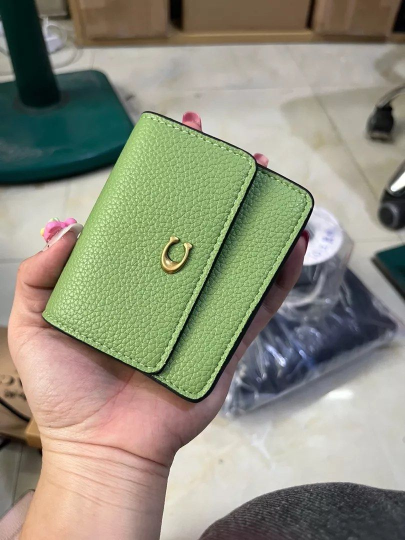 Coach Sling Wallet (Category: Luxury Bags & Wallets) located in Manila. Submitted by czrnsshop (Listing ID 1335218188, Image 2). Description: 3 colors avail blue,green and pinkblack, what you see is what you get with box and paper bag tondo manila location!❤️.