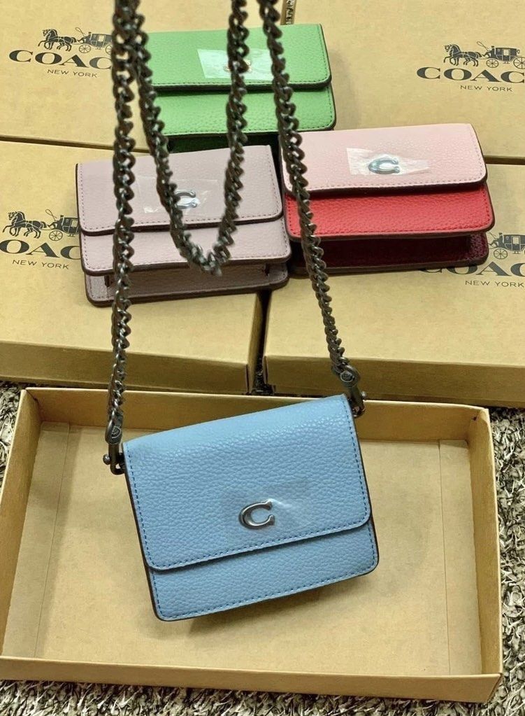 Coach Sling Wallet (Category: Luxury Bags & Wallets) located in Manila. Submitted by czrnsshop (Listing ID 1335218188, Image 3). Description: 3 colors avail blue,green and pinkblack, what you see is what you get with box and paper bag tondo manila location!❤️.