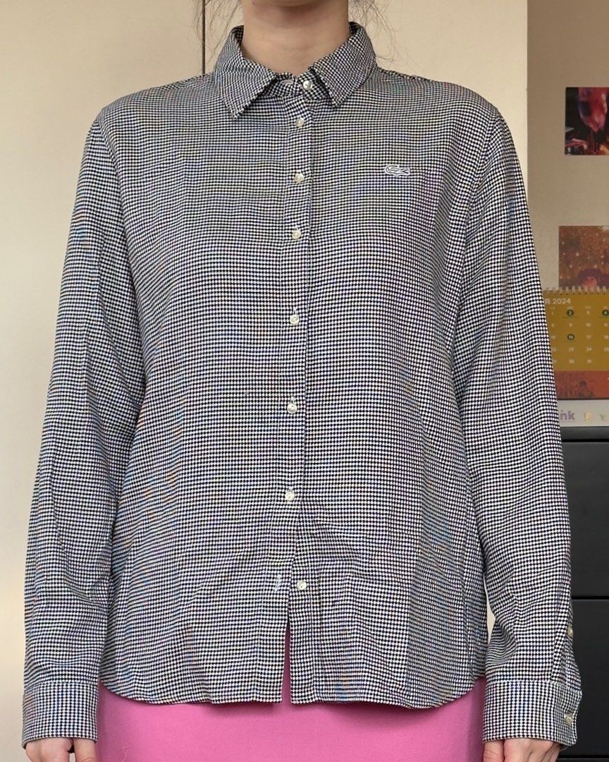 Lacoste Houndstooth Button-up Blouse (Preloved) (Category: Blouses) located in Taguig. Submitted by bunny_declutter (Listing ID 1335099867, Image 1). Description: 𝐦𝐞𝐚𝐬𝐮𝐫𝐞𝐦𝐞𝐧𝐭𝐬 (𝐥𝐚𝐢𝐝 𝐟𝐥𝐚𝐭) total length: 23 1/2” shoulder to shoulder: 15” width: 19” sleeve length: 22 1/2” 𝐦𝐚𝐭𝐞𝐫𝐢𝐚𝐥: 100% cotton 𝐜𝐨𝐥𝐨𝐮𝐫: black and white houndstooth pattern 𝐫𝐞𝐚𝐬𝐨𝐧 𝐟𝐨𝐫 𝐬𝐚𝐥𝐞: selling this for my cousin ☆彡 fabric is of amazing