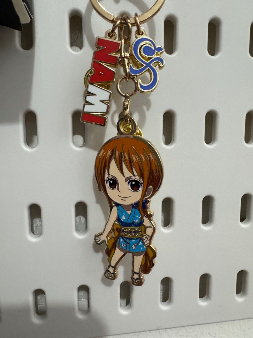 One Piece Blind box Metal Keychain "Nami" (Category: Vintage Collectibles) located in Dagupan City. Submitted by rzqueen.thriftshop (Listing ID 1335195952, Image 2). Description: with Official Toei Animation License Grant Sticker at the box seen at the pic.