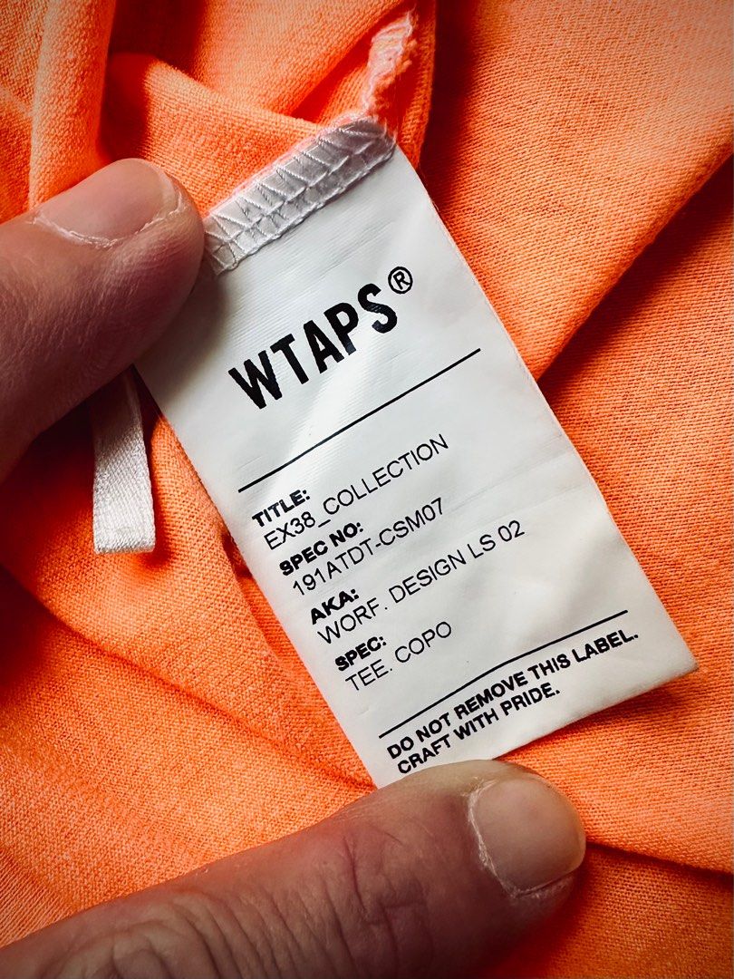 Wtaps (Category: Tshirts & Polo Shirts) located in Singapore. Submitted by selethavsvm (Listing ID 1335153548, Image 4). Description: Wtaps EX_38 LS Pocket Tee “WORF STENCIL” Size : 02 Medium (Fits Large) Color : Highlight Orange Condition : Like New 💯 Authentic Price is fixed. Non Neogtiable. COD. Deal at my convenience. What you see is what you will get from pictures taken above. Have Sent for Dry Cleaning Service. Without Sweat Odour/ Stained