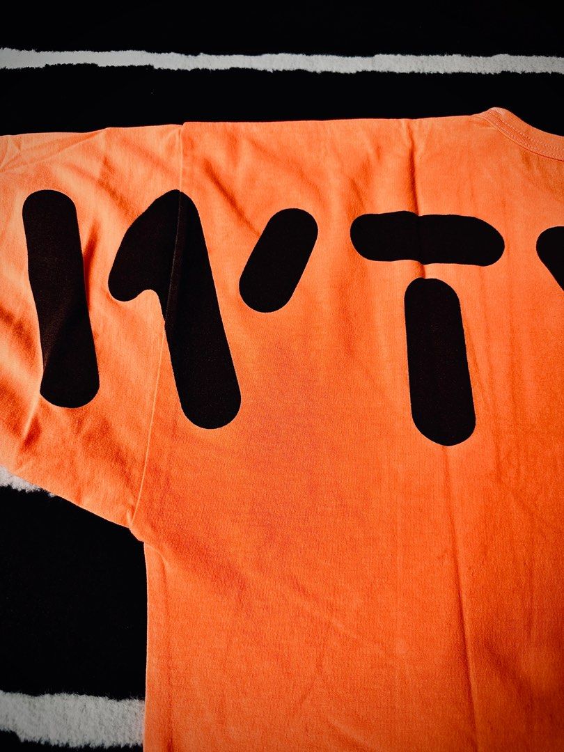 Wtaps (Category: Tshirts & Polo Shirts) located in Singapore. Submitted by selethavsvm (Listing ID 1335153548, Image 6). Description: Wtaps EX_38 LS Pocket Tee “WORF STENCIL” Size : 02 Medium (Fits Large) Color : Highlight Orange Condition : Like New 💯 Authentic Price is fixed. Non Neogtiable. COD. Deal at my convenience. What you see is what you will get from pictures taken above. Have Sent for Dry Cleaning Service. Without Sweat Odour/ Stained