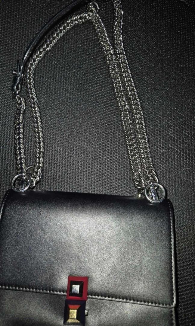 Authentic Fendi (Category: Luxury Bags & Wallets) located in Batangas. Submitted by selahs-closet (Listing ID 1335249612, Image 2). Description: Authentic Fendi Kan I Small Crossbody Bag P40,000 Authentic With Entrupy authentication Inclusions: Free black dustbag Tag Flaws: Faded stamp Lipstick stains inside the bag Meet-up locations: Mitsukoshi Mall / Uptown Mall Southwoods Mall / Robinsons Galleria South.