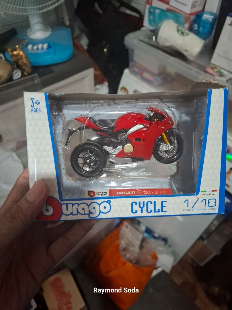 Burago Ducati Panigale 1/18 (Category: Vehicle & Diecast Models) located in Las Pinas. Submitted by All.here_OnlineShop (Listing ID 1335240853, Image 1). Description: Burago 1/18 Ducati Panigale. Itembis in mint condition. The box has a torn part. 350 only. Shipping via LBC or JRS (Provincial) Lalamove (same day delivery within Metro Manila). Items are coming from Las piñas. *items are considered sold and given in good condition unless otherwise 
