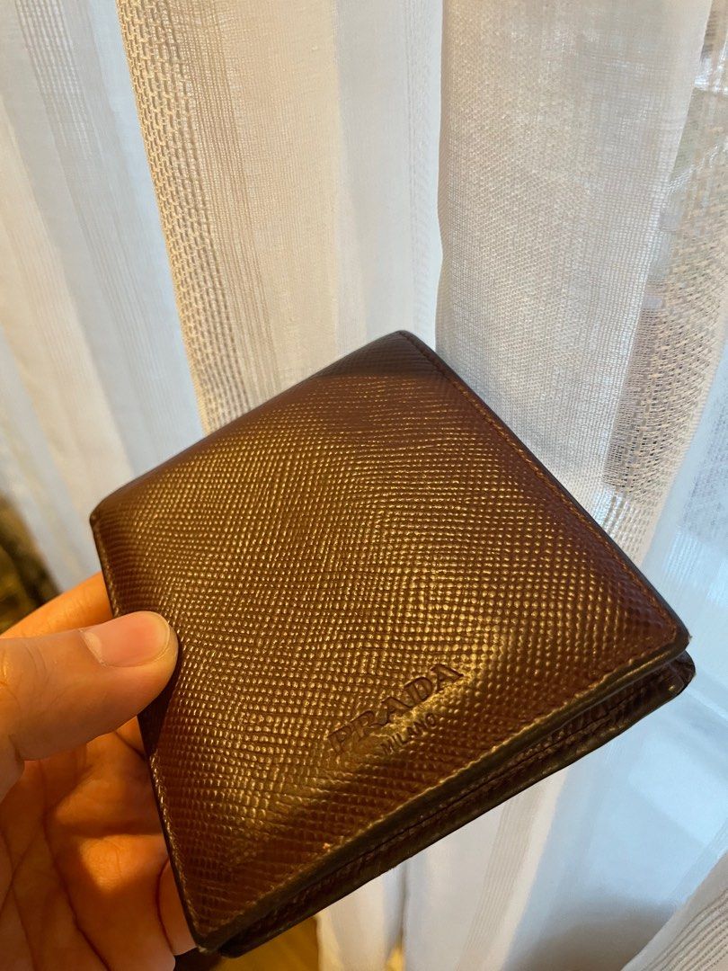 Prada Saffiano wallet (Category: Luxury Bags & Wallets) located in San Juan City. Submitted by cycles.mnl (Listing ID 1335254741, Image 3). Description: Used Prada wallet in Saffiano leather Good condition Normal wear on exterior No other issues.