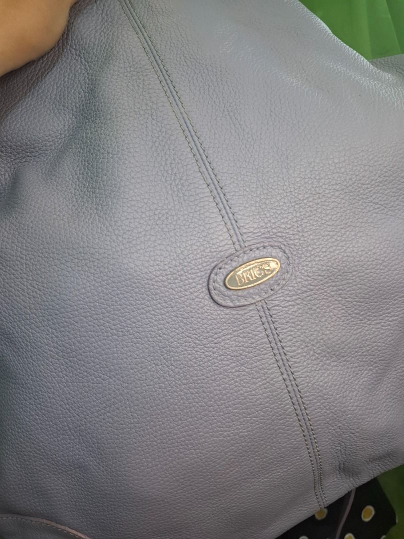 Genuine Leather 2way Bag -PRELOVED Brics (Category: Shoulder Bags) located in Bulacan. Submitted by juliebeh (Listing ID 1339189449, Image 2). Description: Item- Hobo with long shoulder strap On tag- Brics Size approx-HxLxBase(inches)- 16.5x18 Strap- both straps removable: yes, adjustable: no Color- blue - powder Material- leather Hardware- matte silver -faded Inner Lining-fabric Main Closure- magnet snap Main Compartment- 1 pockets inside- 2 ope