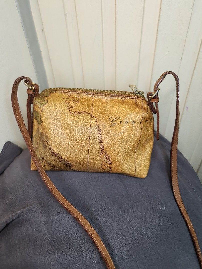 Alviero map bag sling bag small (Category: Luxury Bags & Wallets) located in Taguig. Submitted by starbucksph (Listing ID 1339221963, Image 1). Description: authentic Alviero map bag sling bag small T'Classe.