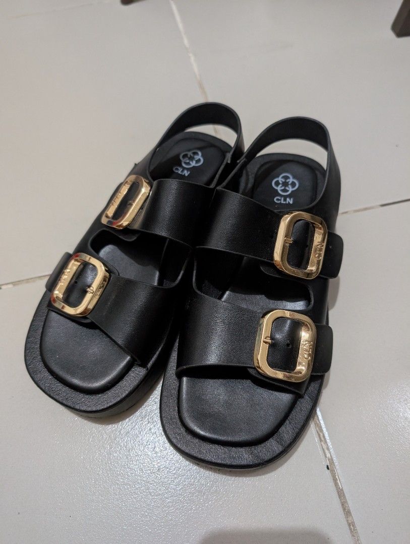 CLN Black Sandals with gold buckle (Category: Flats & Sandals) located in Pasig City. Submitted by dreambox112 (Listing ID 1339360437, Image 3). Description: Used 2x only. Size 7 but fits size 6 (size 6 ako usually sa sandals). Pickup : Ortigas / Estancia Mall.