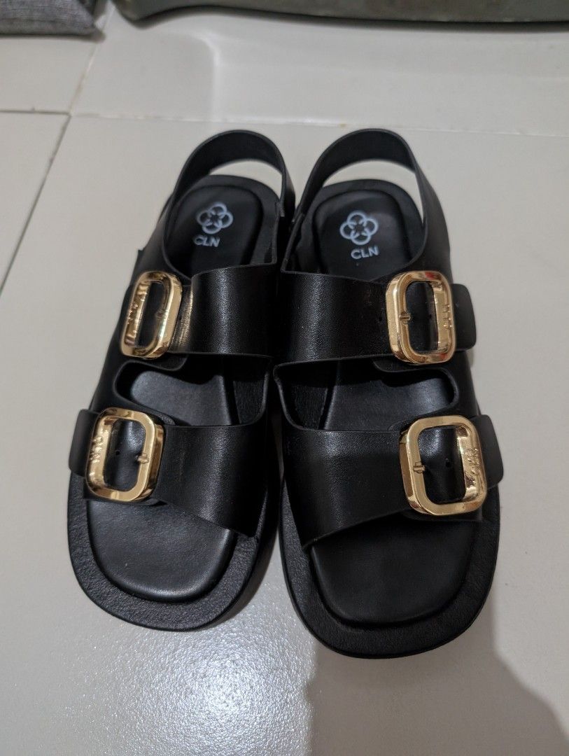 CLN Black Sandals with gold buckle (Category: Flats & Sandals) located in Pasig City. Submitted by dreambox112 (Listing ID 1339360437, Image 2). Description: Used 2x only. Size 7 but fits size 6 (size 6 ako usually sa sandals). Pickup : Ortigas / Estancia Mall.