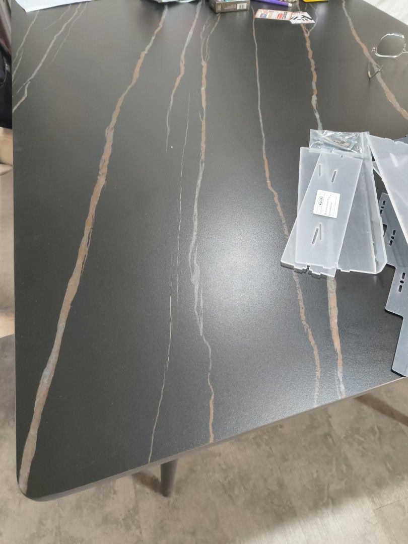 Dining Table (Category: Other Home Furniture) located in Singapore. Submitted by babyblue8899 (Listing ID 1339270645, Image 1). Description: Matt Black + Gold Marble Table About 160cm Can sit 6 people. please arrange own mover..