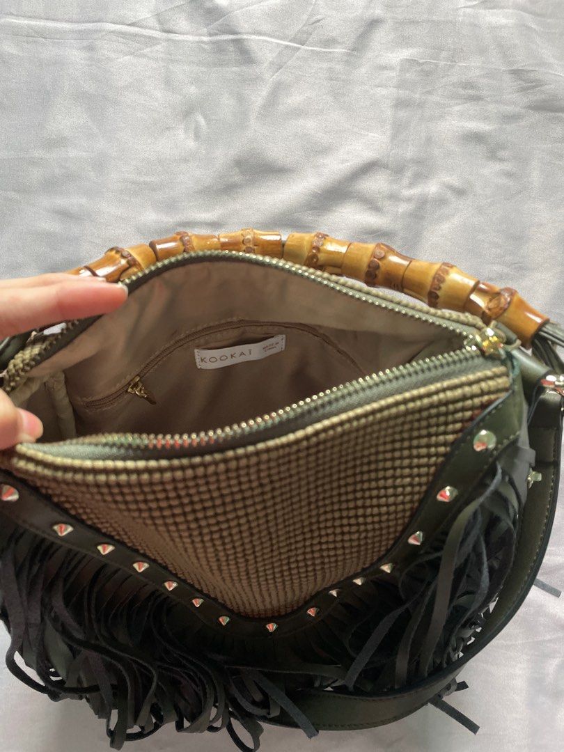 Fringe Hand Bag (Category: Purses & Pouches) located in Davao. Submitted by ralacs (Listing ID 1339175490, Image 3). Description: Price is negotiable Brand New Kookai (Australian brand) Fringe Bag with Bamboo Handle Comes with sling.
