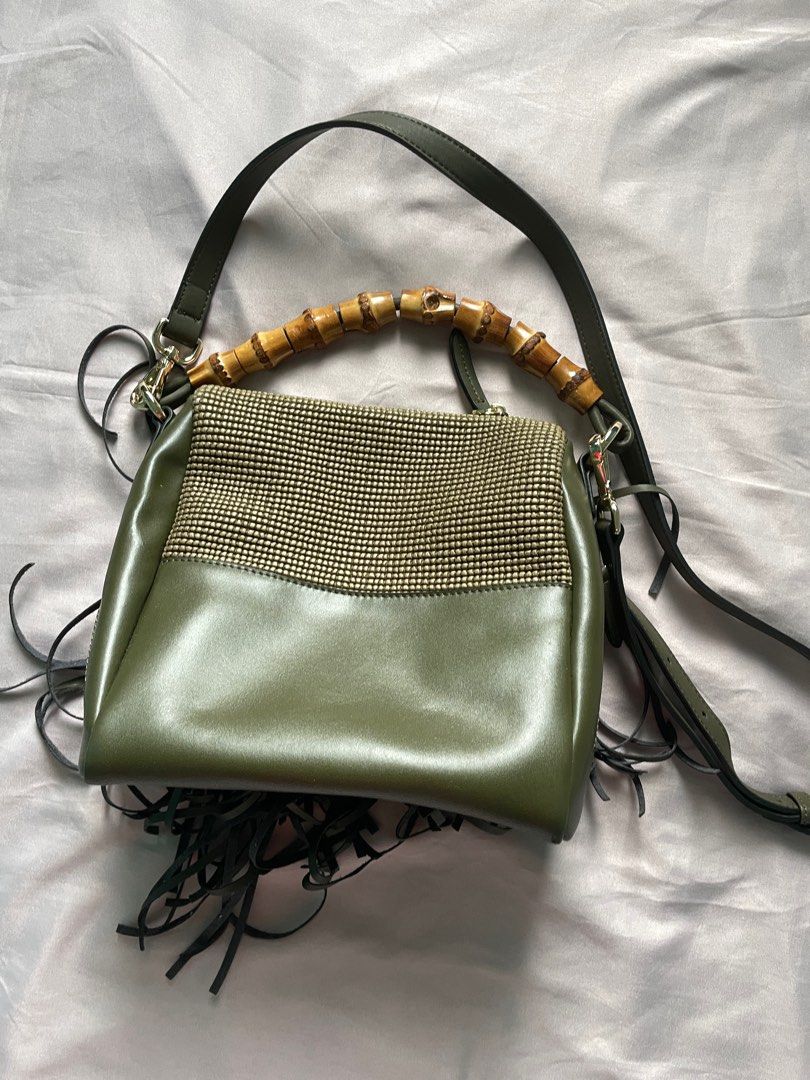 Fringe Hand Bag (Category: Purses & Pouches) located in Davao. Submitted by ralacs (Listing ID 1339175490, Image 2). Description: Price is negotiable Brand New Kookai (Australian brand) Fringe Bag with Bamboo Handle Comes with sling.