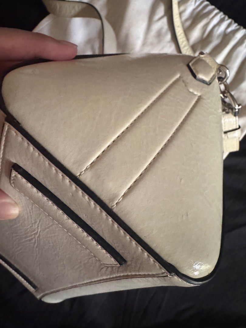 Givenchy Mini Antigona in White Wrinkled Leather (Category: Luxury Bags & Wallets) located in Manila. Submitted by yam.sanandres (Listing ID 1339201577, Image 3). Description: Rating: 7.5/10 With dust bag and care cards For color refresh.