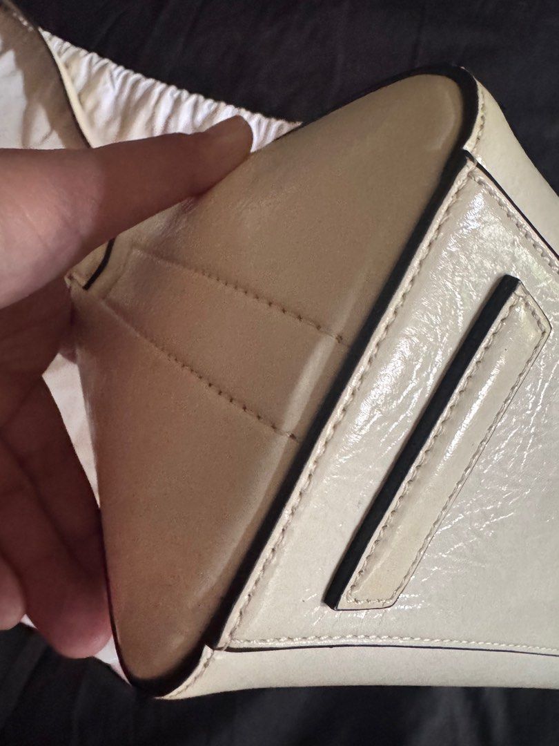 Givenchy Mini Antigona in White Wrinkled Leather (Category: Luxury Bags & Wallets) located in Manila. Submitted by yam.sanandres (Listing ID 1339201577, Image 2). Description: Rating: 7.5/10 With dust bag and care cards For color refresh.