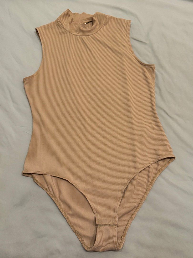 H&M Ribbed Turtleneck Bodysuit (Category: Sleeveless) located in Taguig. Submitted by stxff_ (Listing ID 1339361125, Image 3). Description: H&M ribbed mock turtleneck bodysuit in beige with detachable opening Size: M-L .