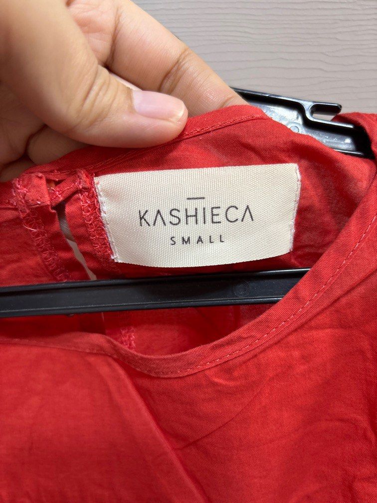 Kashieca Tangerine Coloured Top -Layered design (Category: Blouses) located in Pasig City. Submitted by ez_declutterz (Listing ID 1339217370, Image 2). Description: Like new. Like linen Fabric. Small on Tag.
