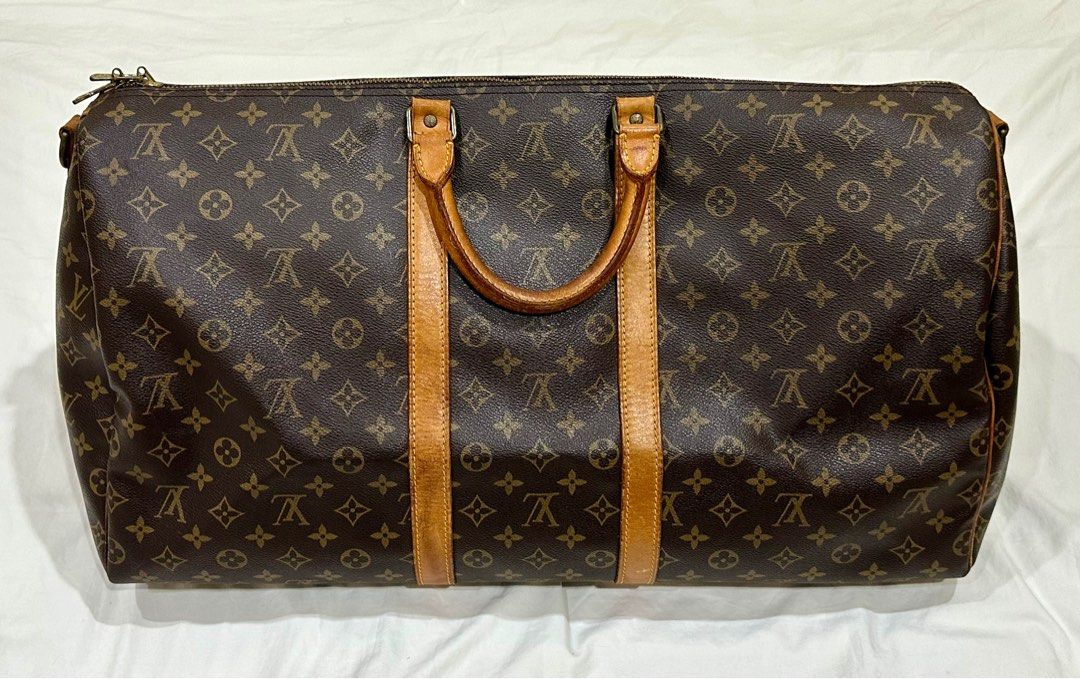 Louis Vuitton Keepall 55 Bandouliere (Category: Luxury Bags & Wallets) located in Taguig. Submitted by psg_makinarya (Listing ID 1339202960, Image 3). Description: Louis Vuitton Keepall 55 Bandouliere Classic Monogram in LV coated canvass Asking price is 29K — let me know your best offer. RFS: seldom use .
