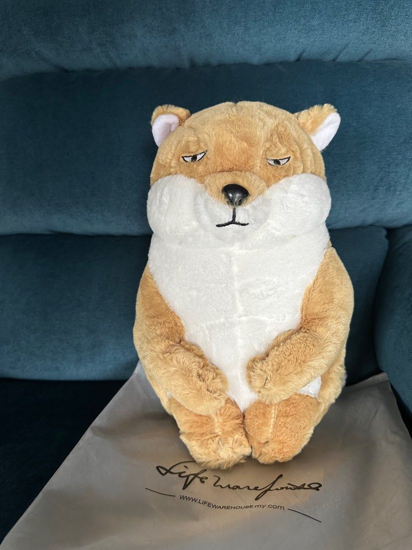 Mad dog plushie / stuffed Toy (Category: Plushies & Soft Toys) located in Marikina City. Submitted by samndbx (Listing ID 1339210276, Image 1). Description: Cute and funny “sungit” shiba inu plush / stuffed toy Never used / Kept in original packaging Approx: Height: 32cm / 12.6 inches Width: 23cm / 9 inches Rfs: decluttering.
