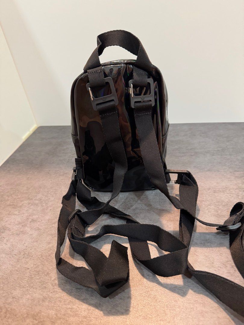 Mini Backpack (Category: Backpacks) located in Singapore. Submitted by wang_wang88 (Listing ID 1339278090, Image 2). Description: Adidas Originals Black Mini Backpack Brand new with tag Dimensions: 4” x 6” x 8” 100% polyester twill Front zip pocket Oversize zipper pull on main compartment Adjustable shoulder straps Carry handle Product colour: Black.