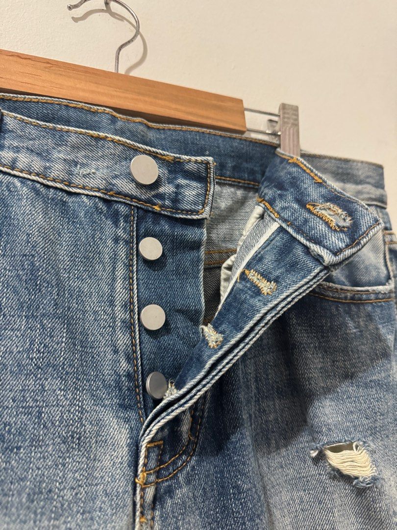 Mnml Buttonfly Ankle Zip Ripped Pants (Category: Jeans) located in Meycauayan. Submitted by itstimothrifts (Listing ID 1339298816, Image 3). Description: Mnml Buttonfly Ankle Zip Ripped Pants Excellent Condition No flaws Size 33 on tag Actual Width 33-24 Length 42.5 Front Rise 11.5 Leg Opening 6.5.