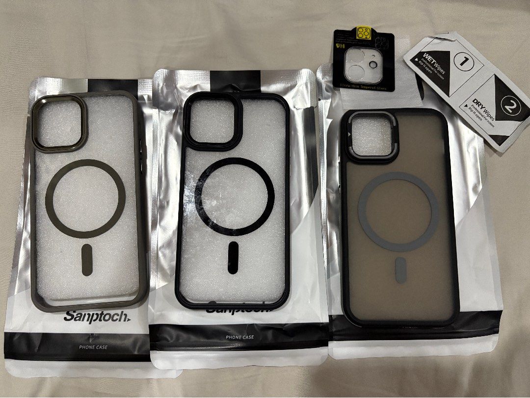 Sanptoch phone cases for iPhone 12/12 Pro (Category: Cases & Sleeves) located in San Juan City. Submitted by mxn.tn (Listing ID 1339333970, Image 1). Description: • Black border cases - magsafe • Case with kickstand - magsafe, comes with camera protector • gray border case - SOLD ❌ * Preferably sold as a set, for individual prices, DM me * case on left most side and right most side are BRAND NEW * case on the middle is slightly used (used for a m