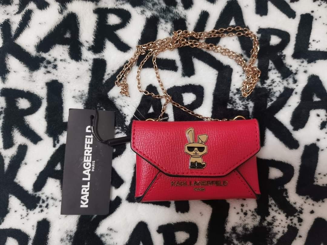 sling wallet (Category: Luxury Bags & Wallets) located in Cainta. Submitted by ronz05 (Listing ID 1339307756, Image 2). Description: brand new.